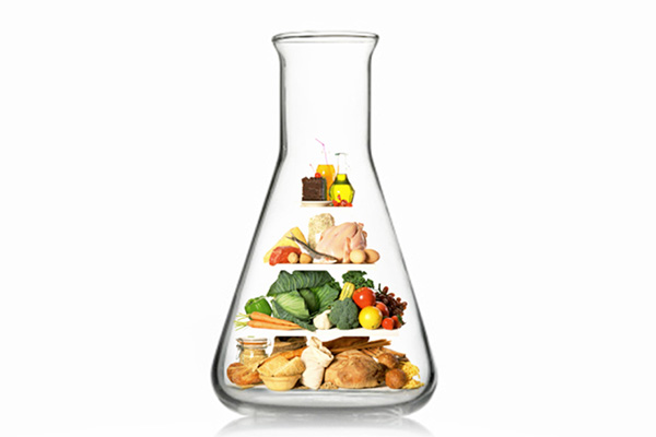 Glass flask with healthy food inside