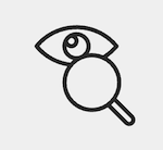An icon of an eye looking through a magnifying glass